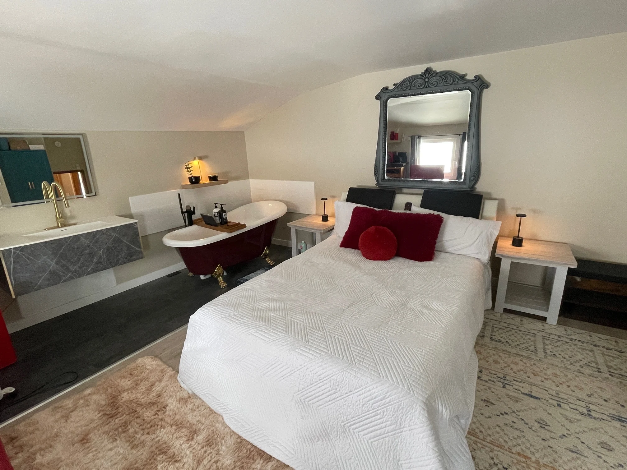 Sip & Soak Retreat spa-style bath with soaking tub and candlelight