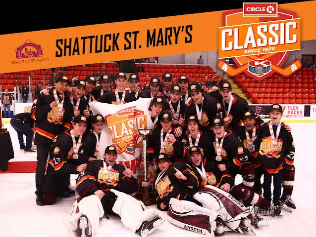 Shattuck St. Mary’s celebrating with the Circle K Classic trophy on the ice